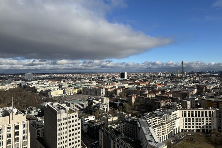 view over Berlin city with clouds