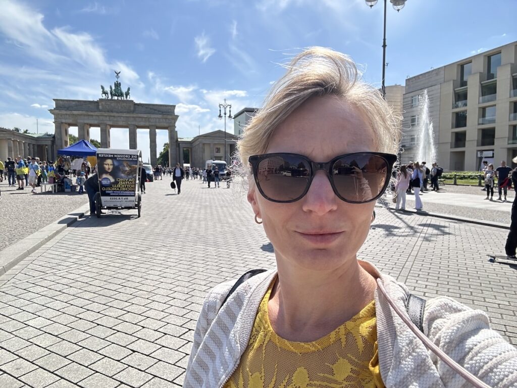 Mandy infront of Brandenburg gate in berlin